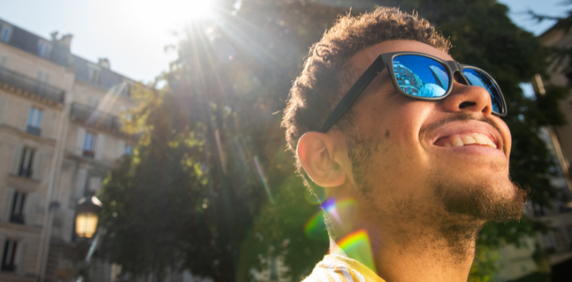 A man wearing polarized sunglasses in the sun