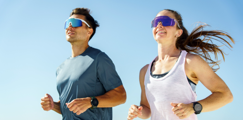 A man and a woman enjoying outdoor running while wearing polarized sunglasses