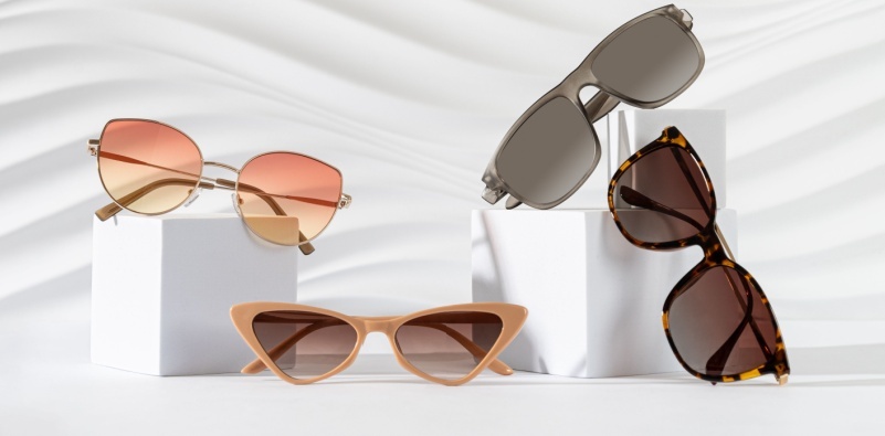 different style sunglasses displayed on white cubes