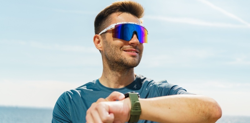 man wearing oversized, sporty futuristic-looking sunglasses