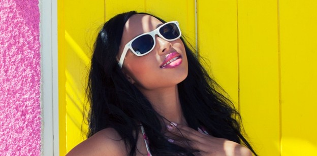 woman wearing white wayfarer sunglasses